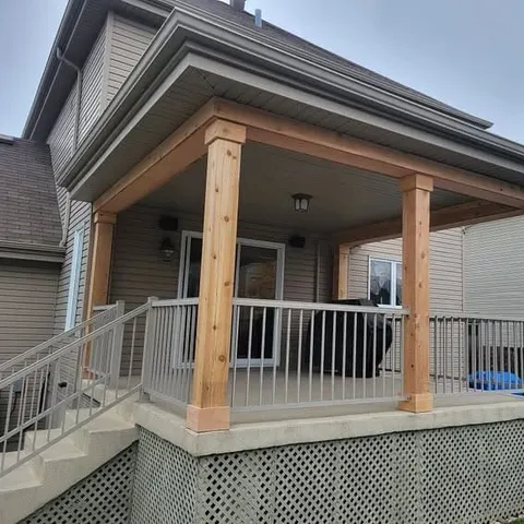 Covered deck with new solid cedar posts and aluminum railing